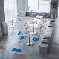 Moderne Industrielle Freizeitmöbel, Edelstahltische, Sitzgruppen und Tragbare Acryl-Klappstühle für Cafés
