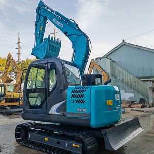 Mini-excavatrice sur chenilles Kobelco SK75 d'<span class=keywords><strong>occasion</strong></span> de haute qualité avec pompe principale, offrant des performances exceptionnelles. - Product Image 1