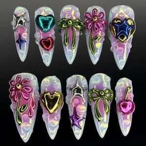 Ongles à presser faits main de luxe extrême, style tendance et chic, avec cœurs 3D chromés et motifs floraux, longs ongles stiletto pour une ambiance haute couture - Product Image 1