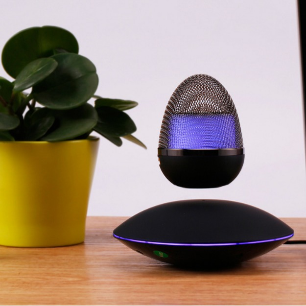 Black base with levitating egg player