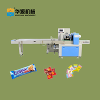 Machine d'emballage en forme de coussin pour bonbons durs, barres de cacahuètes et gâteaux, avec contrôle PLC Huayuan, 40-220 sachets/min