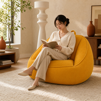 Fauteuil de salon de haute qualité, canapé compressé en boîte, petit canapé jaune moutarde au design cocon pour adultes et enfants dans la salle de lecture