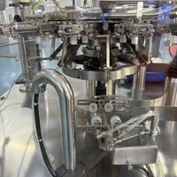Machine d'emballage de remplissage liquide semi-automatique mécanique Elemotion pour les noix, les légumes et les fruits secs