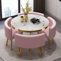 Mobilier de luxe en métal doré pour restaurant ensemble table à manger en marbre avec 4 chaises à vendre