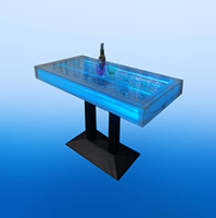 Luxuriöser Acryl-LED-Licht-Couchtisch mit Tischdekoration