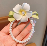 MIO Grande pince à cheveux artificielle en plumeria, nœud papillon, perles, accessoires pour cheveux, différents styles avec long pompon pour enfants et filles