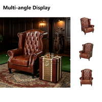 Fauteuil Chesterfield vintage à dossier haut en cuir véritable capitonné, idéal pour hôtel, villa, salle de cigares