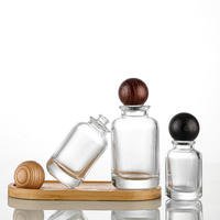 30ML 50ML 100ML Botellas de perfume de vidrio redondas multiespecificación con 15 tapas de bayoneta empaquetadas en tapas de bola de madera de colores