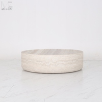 Table basse ronde en fibre de verre de forme travertin, style Wabi Sabi minimaliste moderne et luxueux, pour le salon