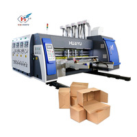 Servo-gestuurde 4-kleuren flexodrukmachine met sleuvenfrees, stans- en stapelmachine voor de productie van 3/5/7-laags golfkartonnen dozen