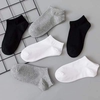 CMAX OEM vente en gros pas cher Spandex coton jetable hommes femmes chaussettes noir blanc gris mélange couleur cheville solide prêt chaussettes