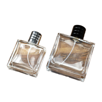 Flacon de parfum rectangulaire transparent de luxe vide de 50 ml en verre gravé à l'acide avec bouchon à vis, vente en gros