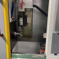 Tour CNC horizontal à cinq axes de haute précision et haute qualité, tête motorisée robuste à commande numérique pour le traitement des tiges métalliques