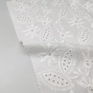 OEMカスタマイズホワイトアイレットコットン刺繍リーフフラワーパターン中空アイレット刺繍ネットレース生地女性用ドレス