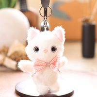 Mini porte-clés en peluche chat noir avec nœud en fourrure et perle, style Kawaii, jouet en peluche, breloque chaton, pendentif