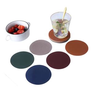 แผ่นรองแก้วหนังแบบกำหนดเองขายส่งปี 2026 แผ่นรองแก้ว PVC ทรงกลมสำหรับร้านกาแฟ - Product Image 1