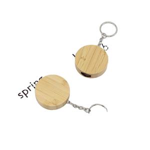 Porte-clés trois-en-un en bois massif de haute qualité, protection de l'environnement, câble de charge rapide - Product Image 1