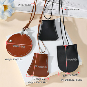 Pochette de rangement en cuir pour le cou, forme ronde et trapézoïdale, portable pour écouteurs, lunettes, clés, couleur ambre et noir, design avec surpiqûres - Product Image 2