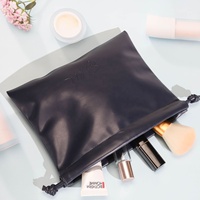 Pochette de maquillage de luxe en cuir Pu avec logo personnalisé sac de rangement étanche en cuir pour pinceaux cosmétiques avec cordon de serrage et poussière