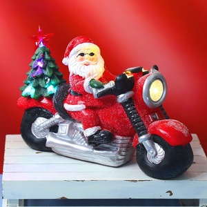 Adornos de Ambiente Navideño con Luces LED de Colores y Música: Santa Claus Conduciendo una Motocicleta en una Escena Nevada - Product Image 5