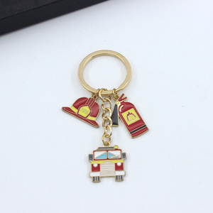 Lot de porte-clés à thème <span class=keywords><strong>pompier</strong></span> : <span class=keywords><strong>camion</strong></span> de pompiers, hydrant, combinaison de <span class=keywords><strong>pompier</strong></span>, extincteur – Promotion sécurité incendie - Product Image 2