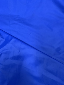 High Quality 380T 20DX20D 100% <strong>Nylon</strong> Taffeta Full Dull <strong>Fabric</strong> Solid Waterproof Down Proof Raincoat <strong>Fabric</strong> - Product Image 2