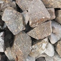 Grand sable de magnésie fondue cristalline mgo 97% poudre de magnésie électrofusion à haute teneur en calcium et à faible teneur en silicium magnésie calcinée morte