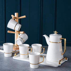 European-style <b>tea</b> <b>set</b>, high-end gift for the living room, gold-painted ceramic water <b>set</b>, <b>cup</b> <b>set</b>, <b>cup</b> handle and tray - Product Image 4