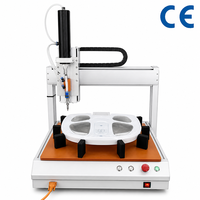 Distributeur de liquides automatique programmable à 3 axes Guangxin pour silicone, colle filetante, adhésif rouge, graisse lubrifiante et adhésif UV