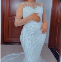 Robe de mariée convertible 2-en-1 avec illusion de perles, manches longues, corsage plissé, jupe de bal détachable et perles scintillantes