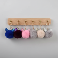Porte-clés en peluche 3D mignon avec oreilles de lapin et pompon ethnique en alliage de zinc, plusieurs couleurs, pour breloque de sac