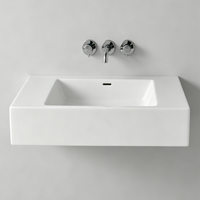 Lavabo mural en marbre à surface solide pour hôtel, avec traitement de polissage, design moderne écologique, robinet monotrou