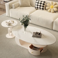 Table basse ovale moderne avec plateau en ardoise et structure en acier au carbone pour petits appartements et salons