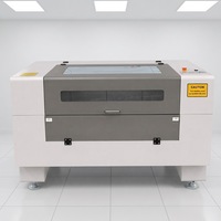 Machine de gravure laser sur tissu, découpeuse laser CO2 pour la découpe de jeans en denim et de textiles