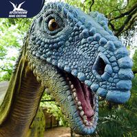 Statue de dinosaure animatronique grandeur nature personnalisable Dino Park en métal et éponge souple pour exposition en intérieur/extérieur dans un parc d'attractions