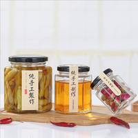 Emballage de miel Pot en verre hexagonal transparent de haute qualité 45ml-730ml pour confiture Sauce chili pâte de citron avec couvercle en métal