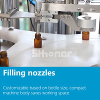 Machine de capsulage de remplissage liquide pour bouteilles à bille roulante en verre pour huiles parfumées déodorantes automatiques