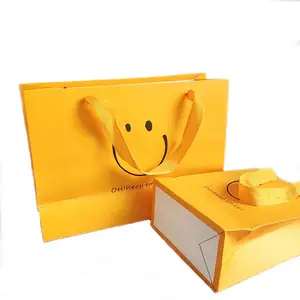 Custom Printed logo Luxury Clothing Shopping Paper Bags Recyclable Gift Bag With Ribbon Rope