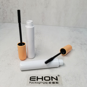 Vente en gros de contenants de mascara cylindriques brillants en ABS/PETG avec couvercle orange, tube à cils vide, emballage cosmétique personnalisé - Product Image 4