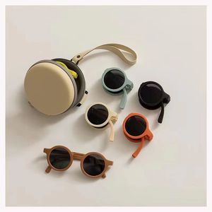 Étui rigide rond en EVA pour lunettes de soleil, personnalisable avec logo, antichoc, portable, avec fermeture éclair, pour lunettes pliables, vente en gros - Product Image 1
