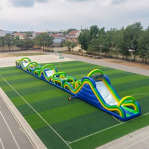 Parcours d'obstacles gonflable géant commercial avec mur d'escalade pour enfants et adultes, idéal pour événements et fêtes en extérieur, location de structure gonflable longue pour course. - Product Image 1
