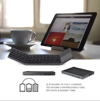 Mini clavier BT pliant chaud Mini clavier pliable BT pour PC Touchpad clavier pliant sans fil Portable
