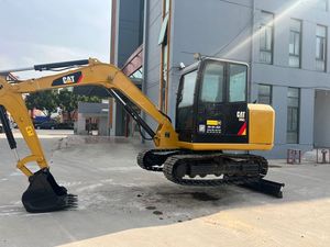 Excavatrice hydraulique CAT 306E2 d'occasion à bas prix, peinture d'origine, bon état, poids opérationnel de 5780 kg avec lame de bouteur - Product Image 1