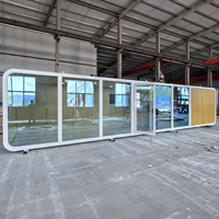 Maisonnette préfabriquée moderne à deux étages de 11800 mm, prête à l'emploi, avec panneaux solaires, style cabane
