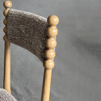 Chaise de salle à manger commerciale rétro rembourrée en bois avec dossier bobine pour restaurant, café, bistrot, hôtel, mobilier Horeca et contractuel