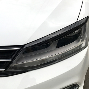Volkswagen Sagitar Jetta MK6 Headlight Eyebrow <b>Stickers</b> Carbon Fiber Texture Piano Black ABS <b>Decal</b> 2011-2017 - Product Image 1