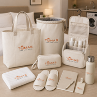 Ensemble souvenir d'hôtellerie VIP haut de gamme avec flacon, journal de voyage, pochette et bougie pour suites d'hôtel et invités d'élite