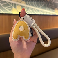 Porte-clés en cuir PU avec 26 lettres de l'alphabet anglais, bracelet en corde tressée, breloque lettre, pendentif de sac