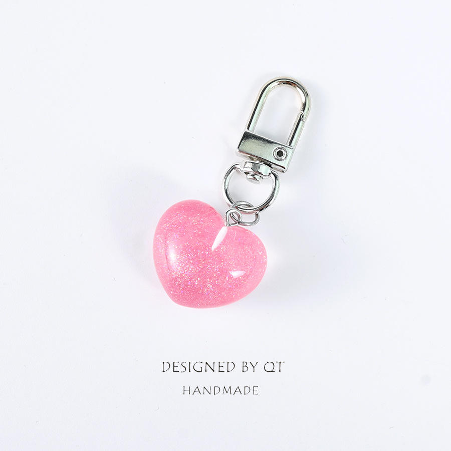 พวงกุญแจเรซิ่นรูปหัวใจสีชมพู