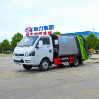 Camion compacteur de déchets Dongfeng Tuyi 3m³ 4x2 avec plaque bleue pour l'élimination des déchets en garage souterrain